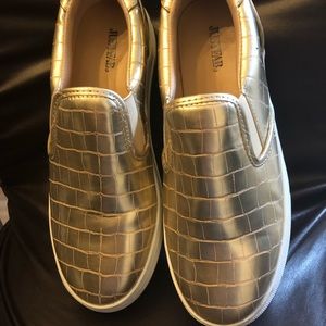 Slip on gold tennis shoes